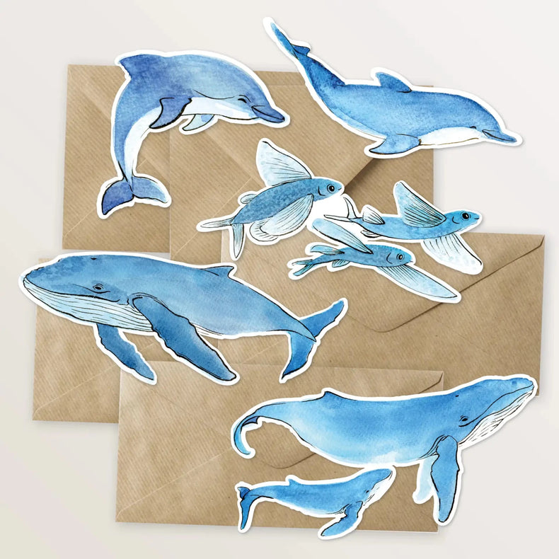 5 cartes, en forme d'animaux marins. - Table à cartes