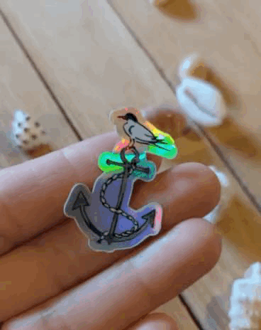 Sticker brillant « Ancre et sterne arctique » sous un autre angle, reflets irisés