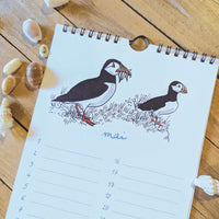 Calendrier perpétuel « Oiseaux de bord de mer », page de mai : deux macareux moines