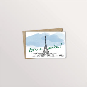 Carte de vœux « Bonne année à Paris » : la tour Eiffel sous un ciel bleu aquarellé