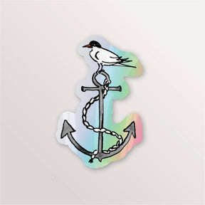 Sticker brillant holographique : sterne arctique posée sur une ancre